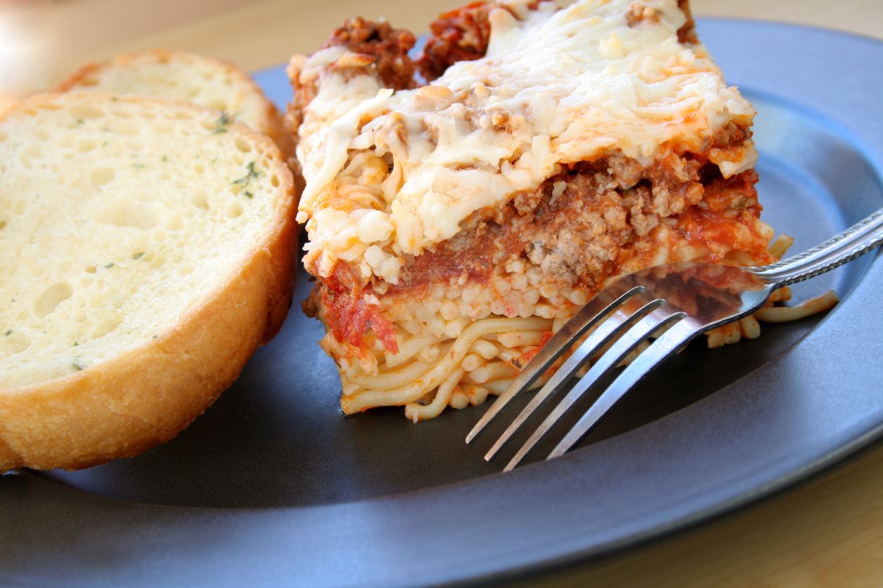 Ovenbaked spaghetti casserole with cheese and weed